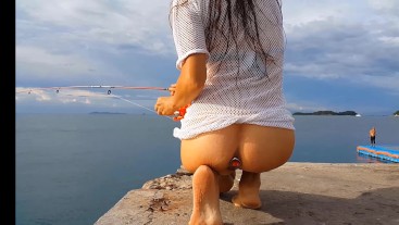 Pussy n Butt Plug FLASHING among fishermen # Public up dress NO PANTIES