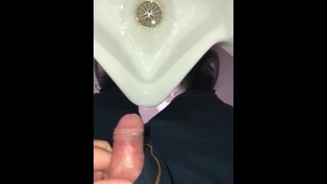 Pulling back foreskin in slow motion just before taking a piss, had to stop, almost caught recording