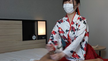 Japanese girl gives a guy a handjob wearing Japanese traditional kimono