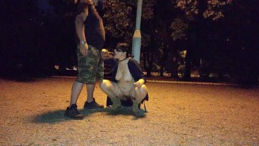 A submisive slut takes a piss in her mouth in a public park