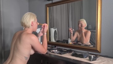 Sexy blonde doing her makeup naked in front of the mirror | sexy posing