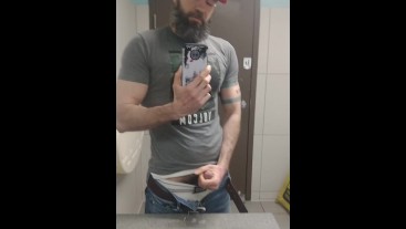 Muscle Daddy Jerks Off In Public Bathroom