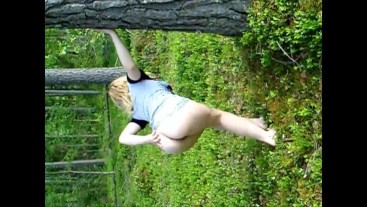Funny girl naked in forest