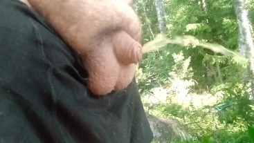 Fat man pissing with uncut dick and massaging his fat turf