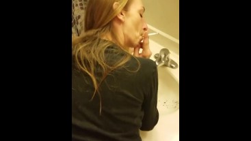 Cute Girl Fucked In Bathroom While She Smokes A Cigarette